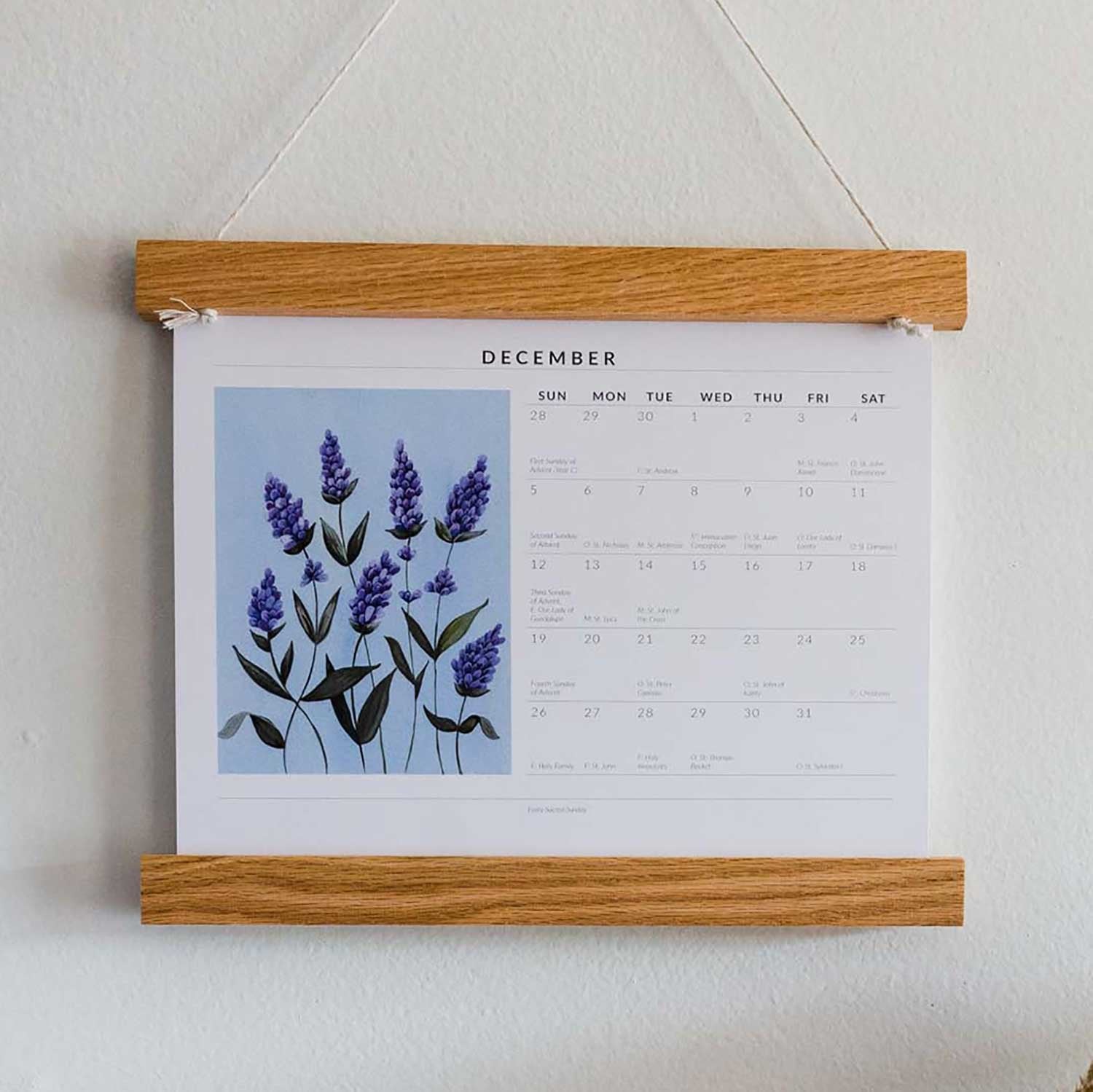 Every Sacred Sunday liturgical calendar hanging on wall