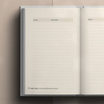 Interior of Catechism Companion Journal showing blank journal pages on light brown background